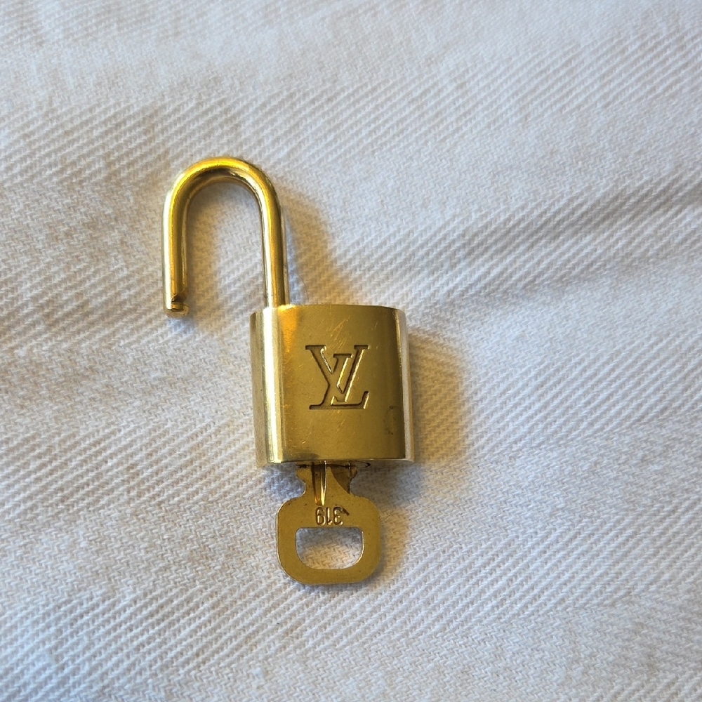 Louis Vuitton Gold Padlock with Key